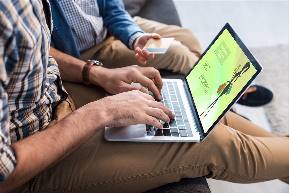 Person registering for an event on a laptop